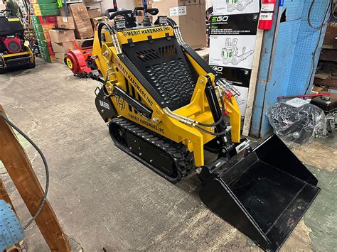 Merit Hardware Inc SK650 mini track loader w/ trailer 